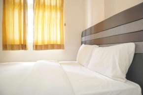 Cozy 2BR Green Pramuka City Apartment near Shopping Mall By Travelio